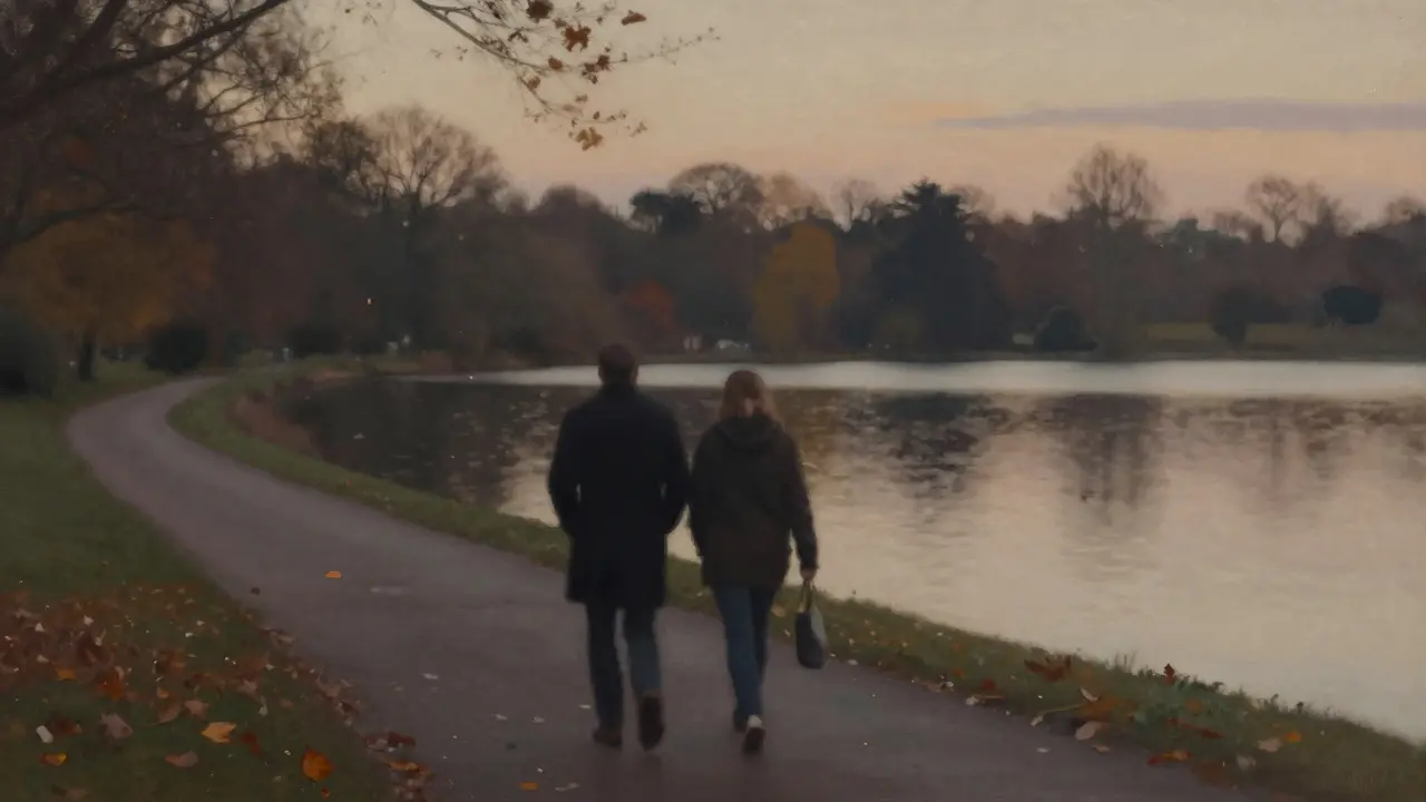 A couple walking peacefully along a lakeside path at dusk in South Norwood.